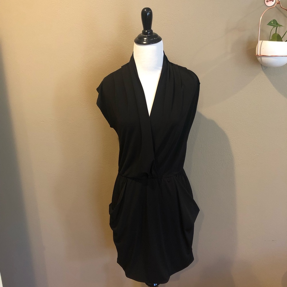 Cute, comfortable, black dress. New without tags. Dress up or dress down.